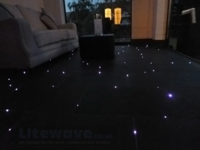 Fibres installed into floor tiles for a star effect